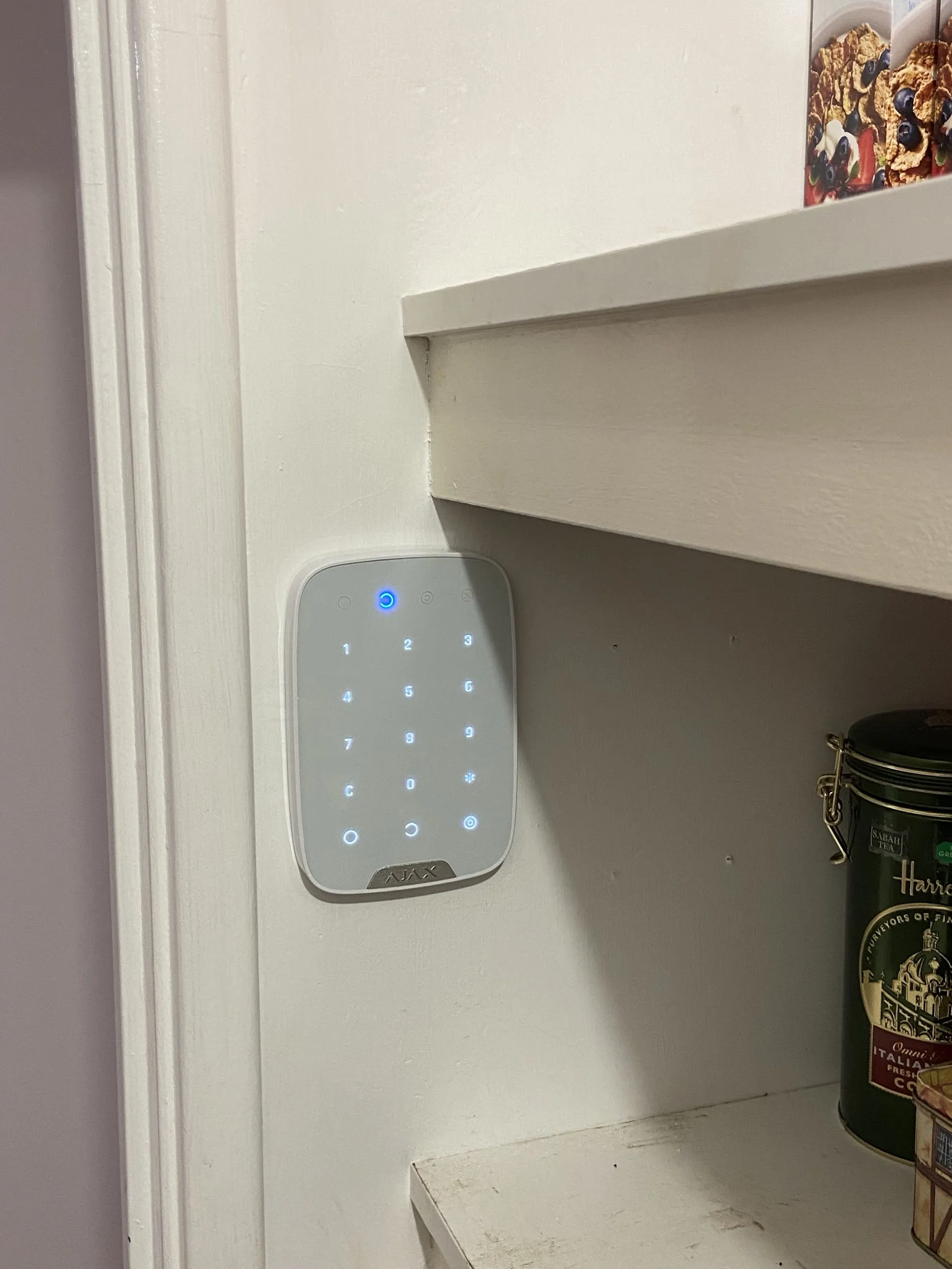 Ajax wireless keypad installed by the entry door of a Perth home