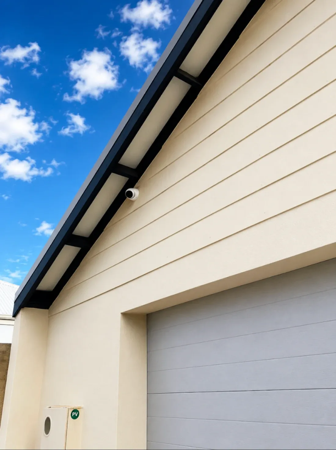 Dahua turret camera installed on a gable above a Perth garage