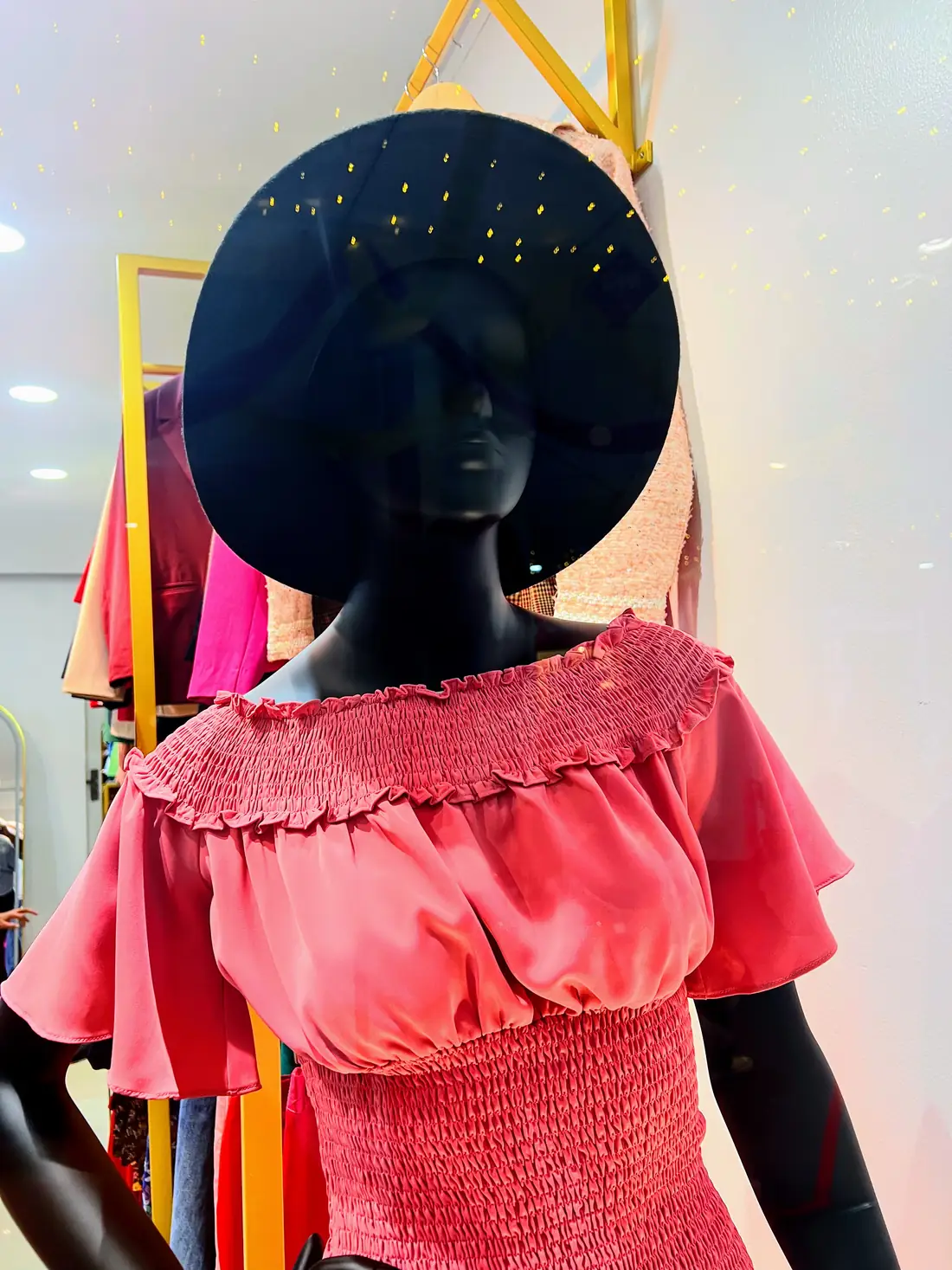 Mannequin and clothing displays inside a fashion boutique