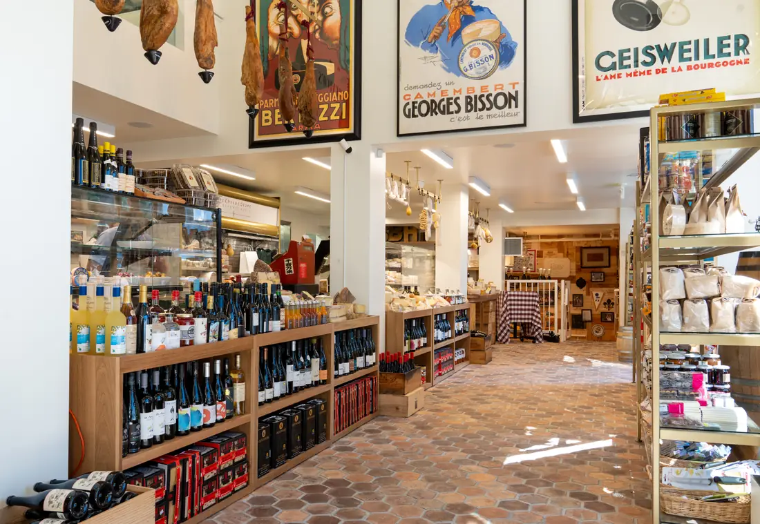 Bottle shop interior with wine bottles displayed on timber shelves